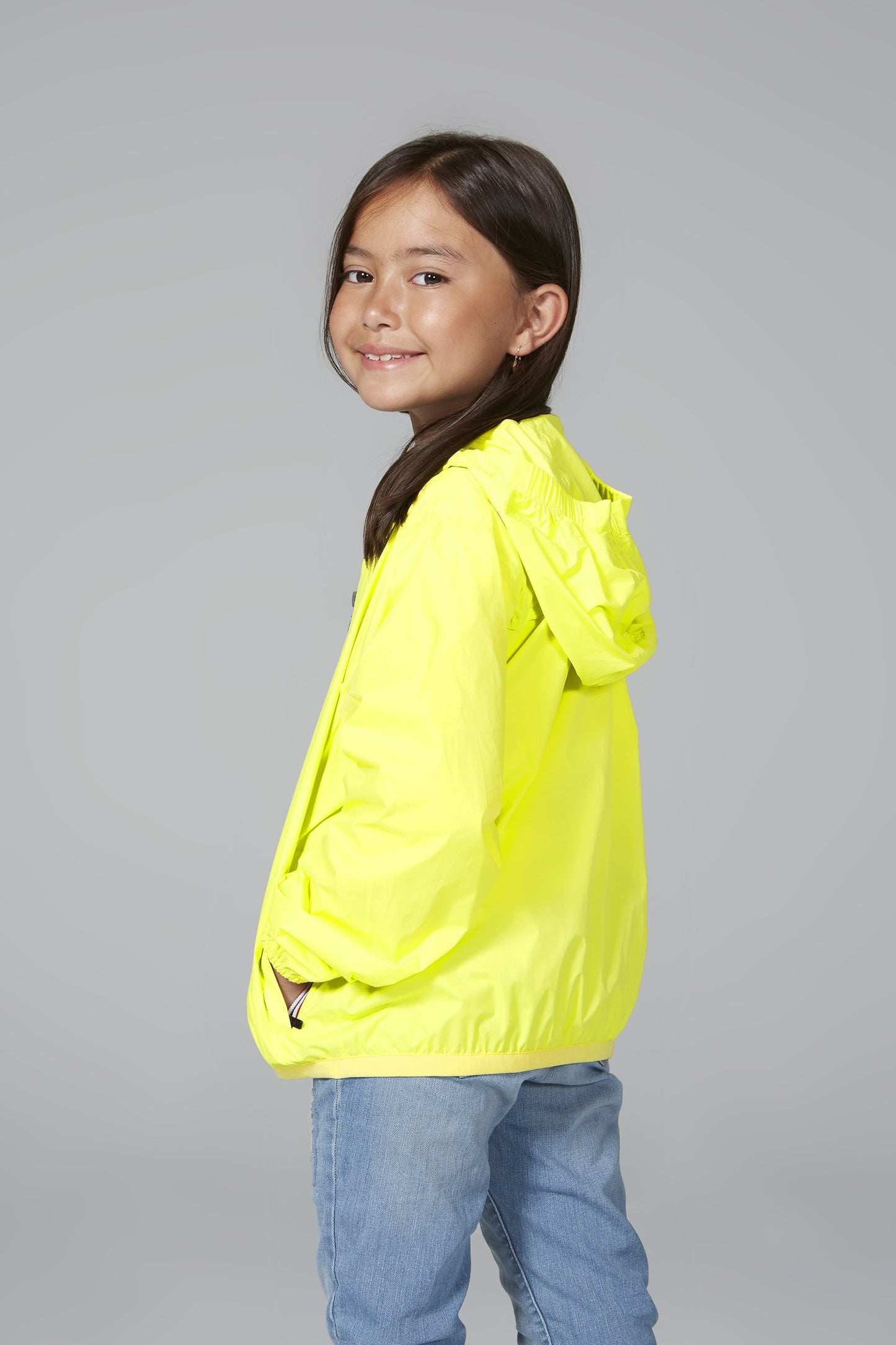 Kids yellow fluo full zip packable rain jacket and windbreaker