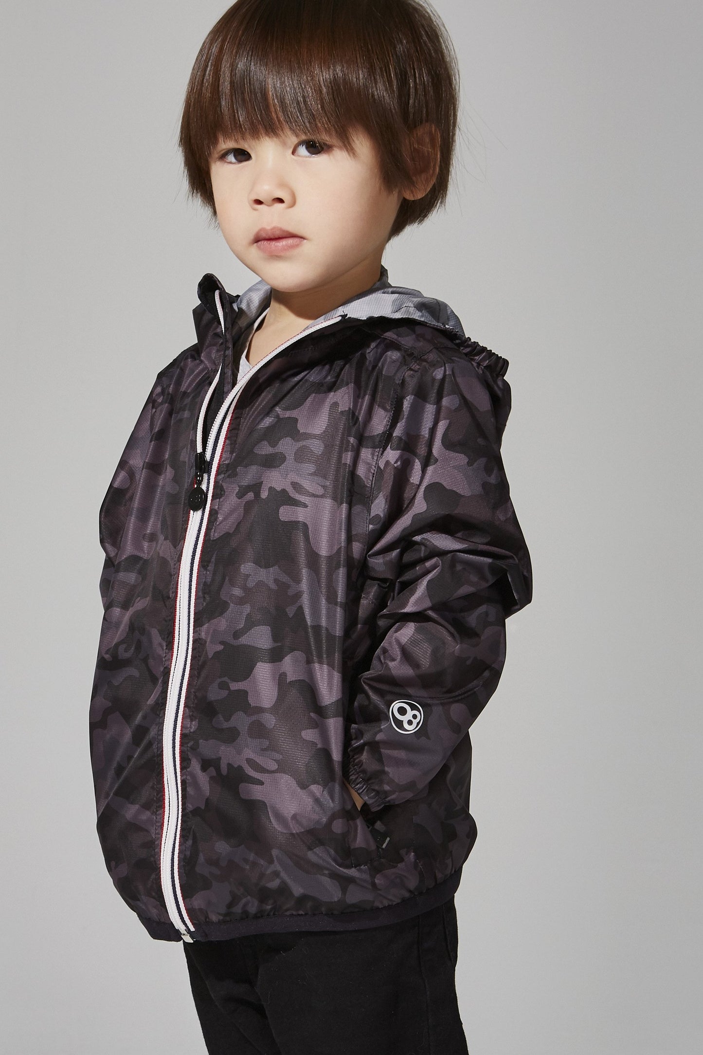 Kids black camo full zip packable rain jacket and windbreaker