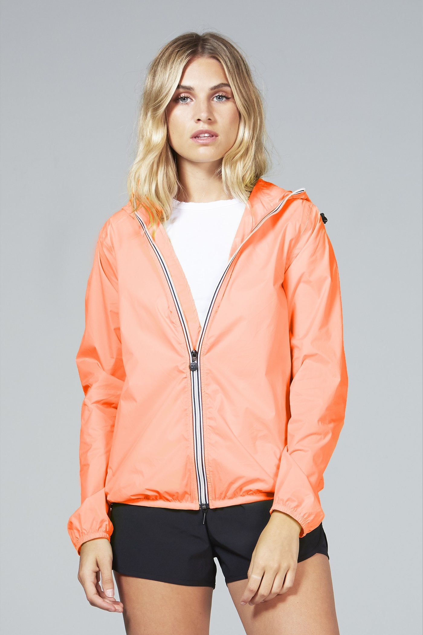 Orange fluo full zip packable rain jacket and windbreaker