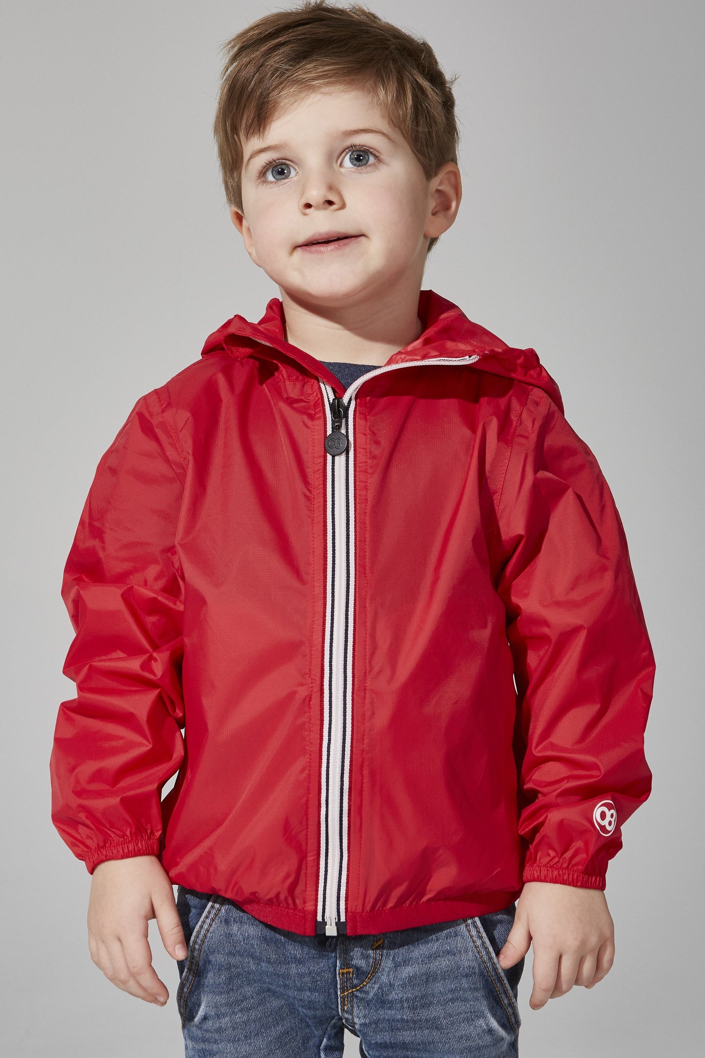 Kids red full zip packable rain jacket and windbreaker