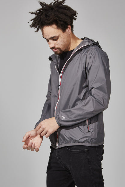 Grey full zip packable rain jacket and windbreaker