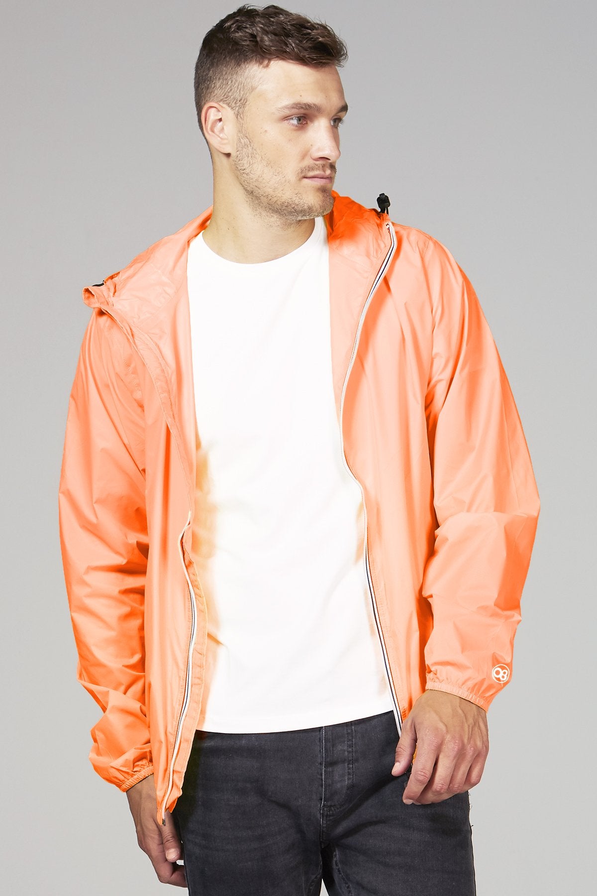 Orange fluo full zip packable rain jacket and windbreaker